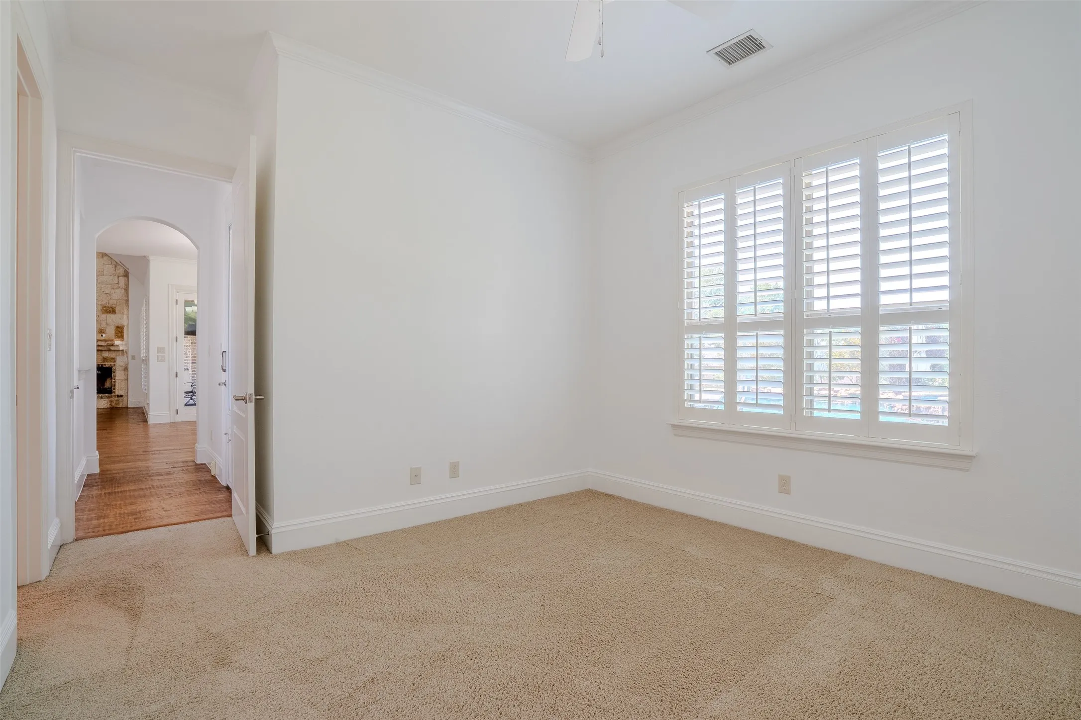 Downstairs secondary bedroom with adjoining bathroom.
