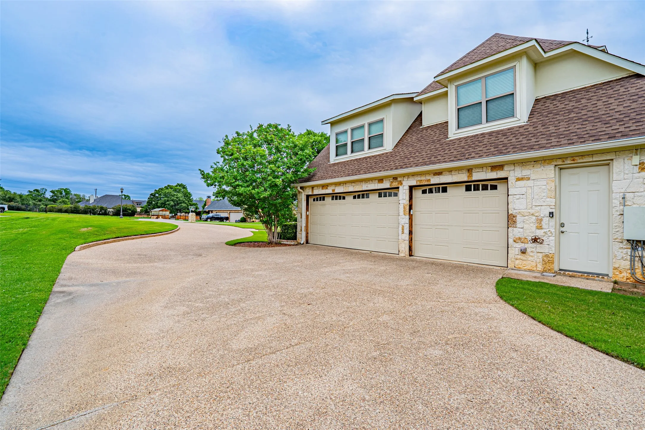 3 car garage looking towards the street