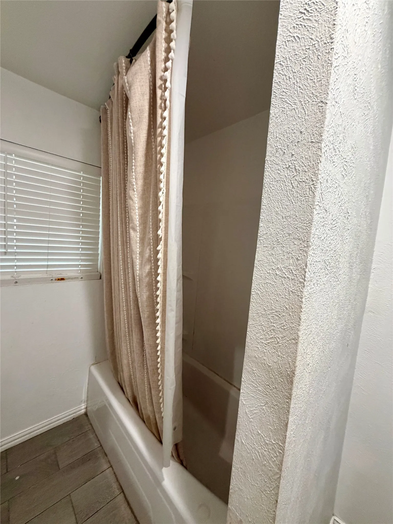 Secondary bathroom with tub shower combo