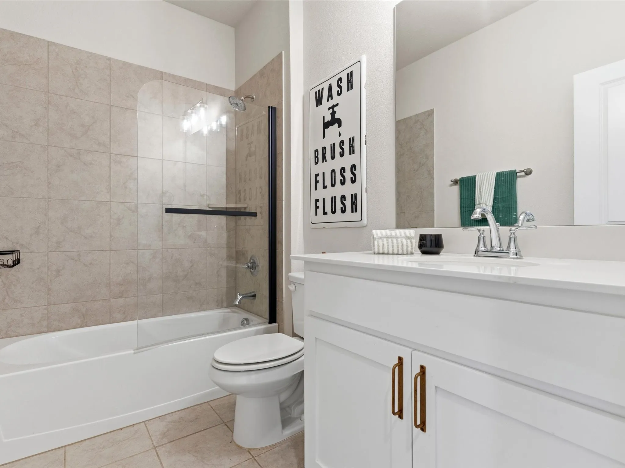 Well-appointed secondary bathroom serving the downstairs bedrooms.
