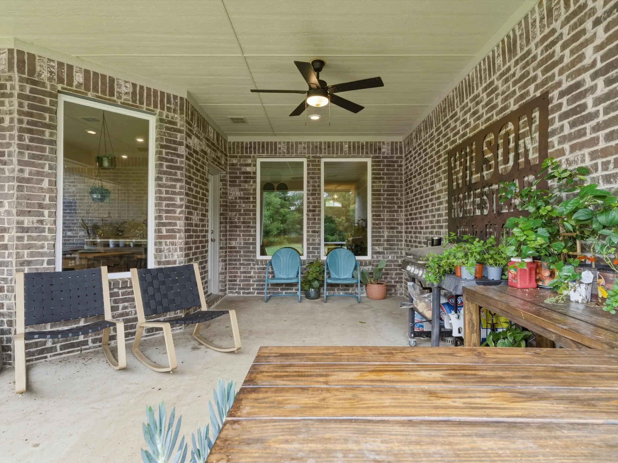 Covered outdoor living space offering the perfect extension of the home's entertaining areas.