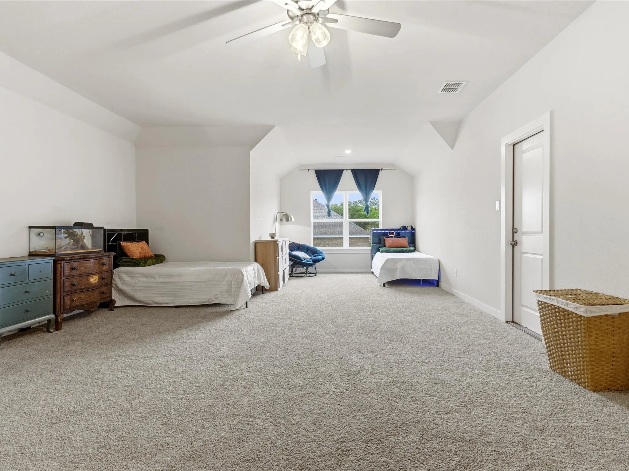 Private upstairs fourth-bedroom suite with its own full bathroom, ideal for guests, multi-generational living, or extended stays.