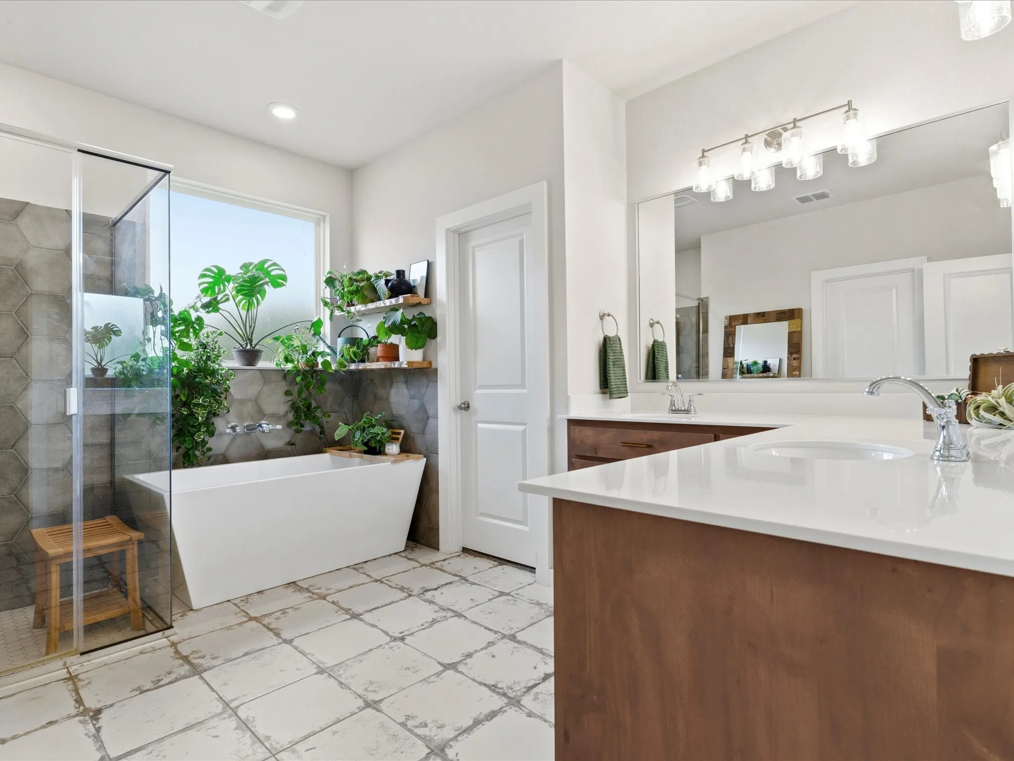 Thoughtfully designed primary bathroom offering comfort, storage, and everyday convenience.