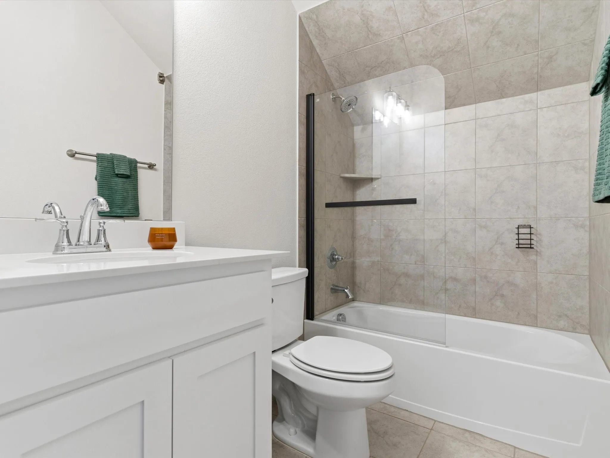 Private full bathroom serving the upstairs fourth-bedroom suite.
