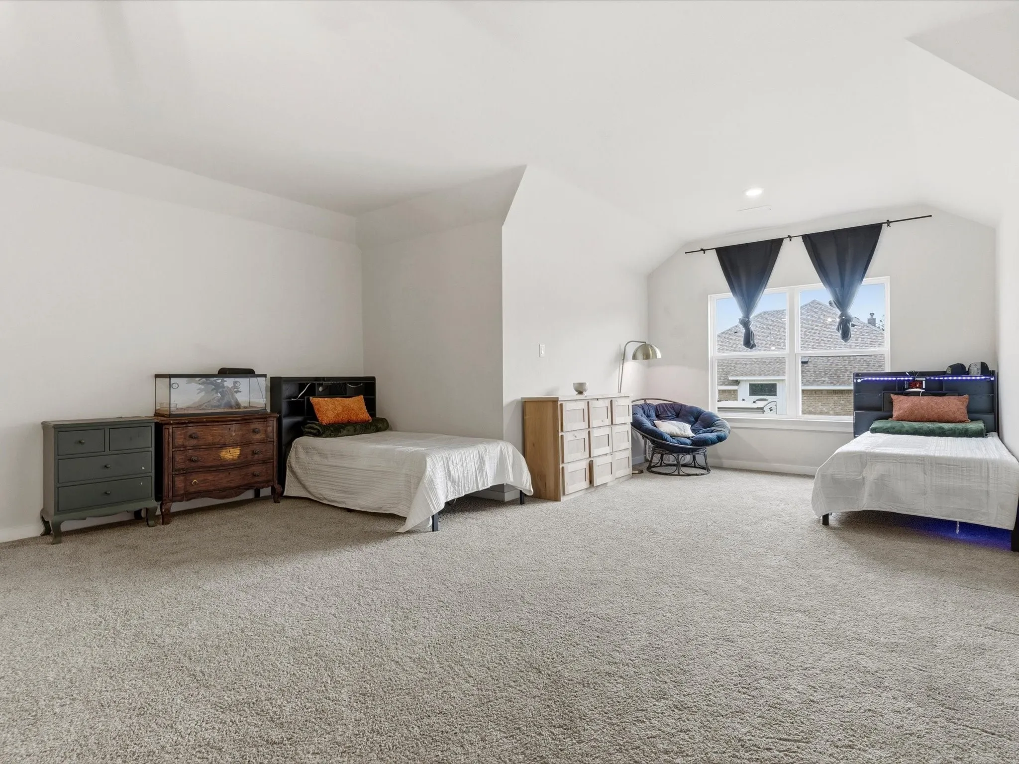 Private upstairs fourth-bedroom suite with its own full bathroom, ideal for guests, multi-generational living, or extended stays.
