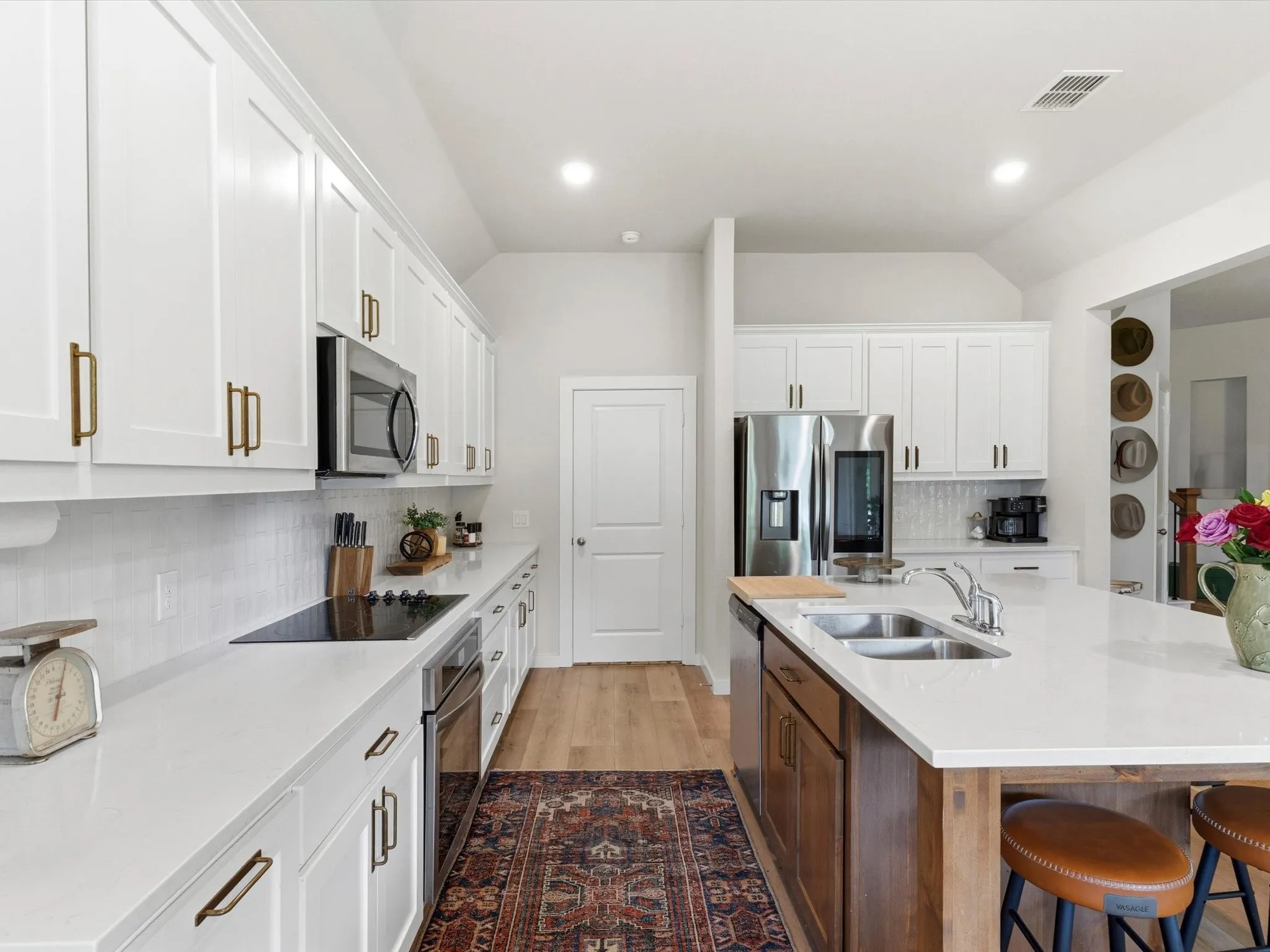 Spacious kitchen designed for entertaining with ample counter space and excellent workflow.