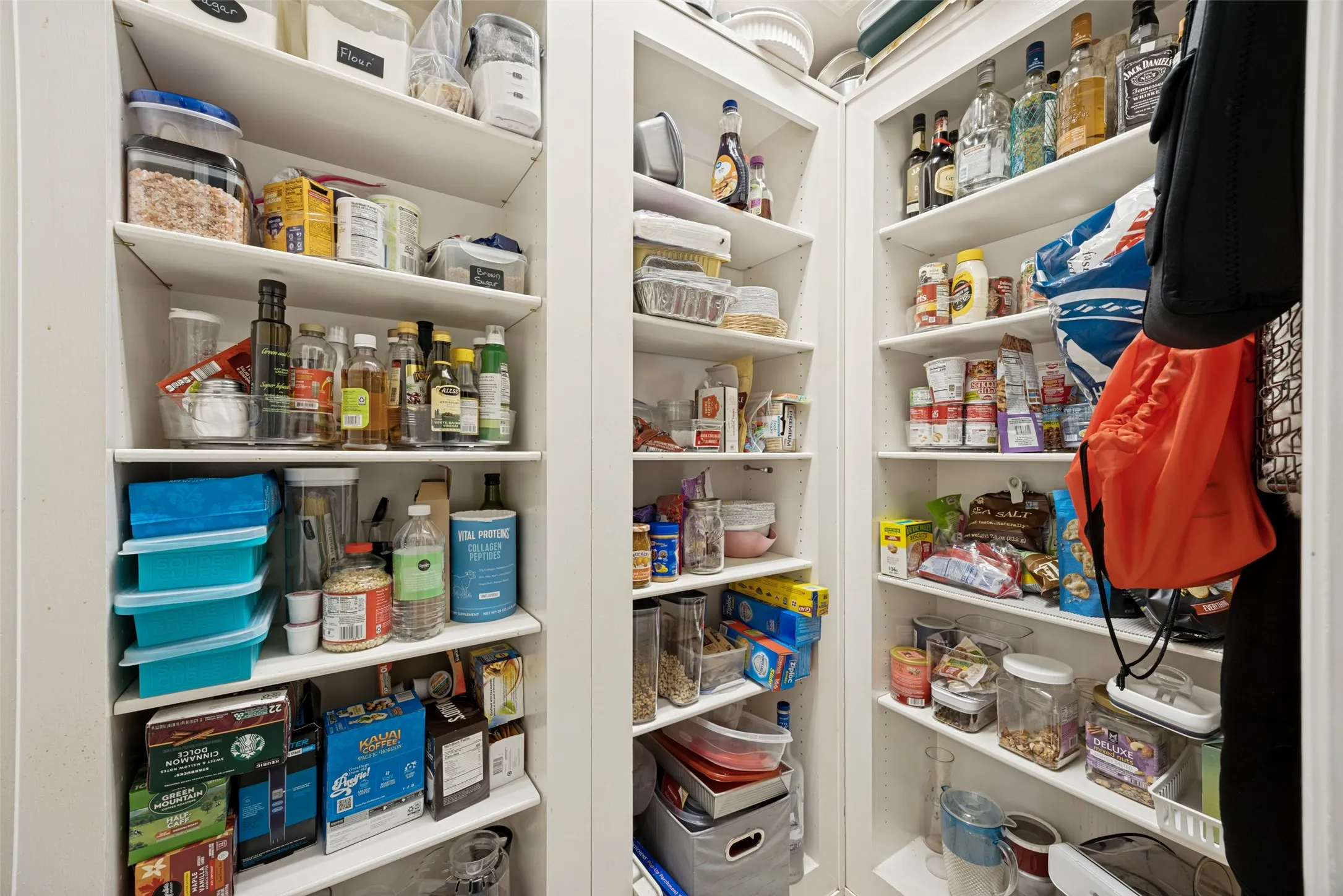 This spacious pantry has more than meets the eye!