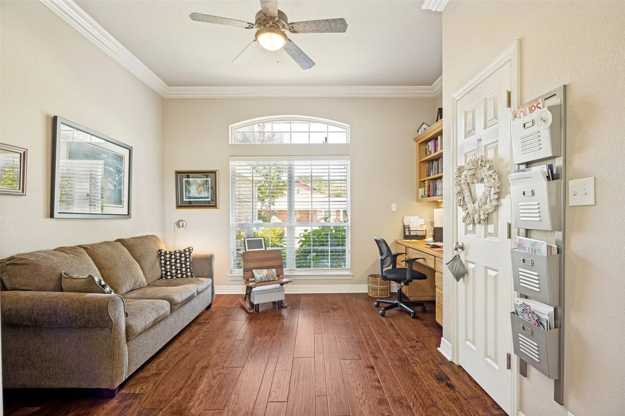 The office is situated just off the main living room and offers ample space for work and play.