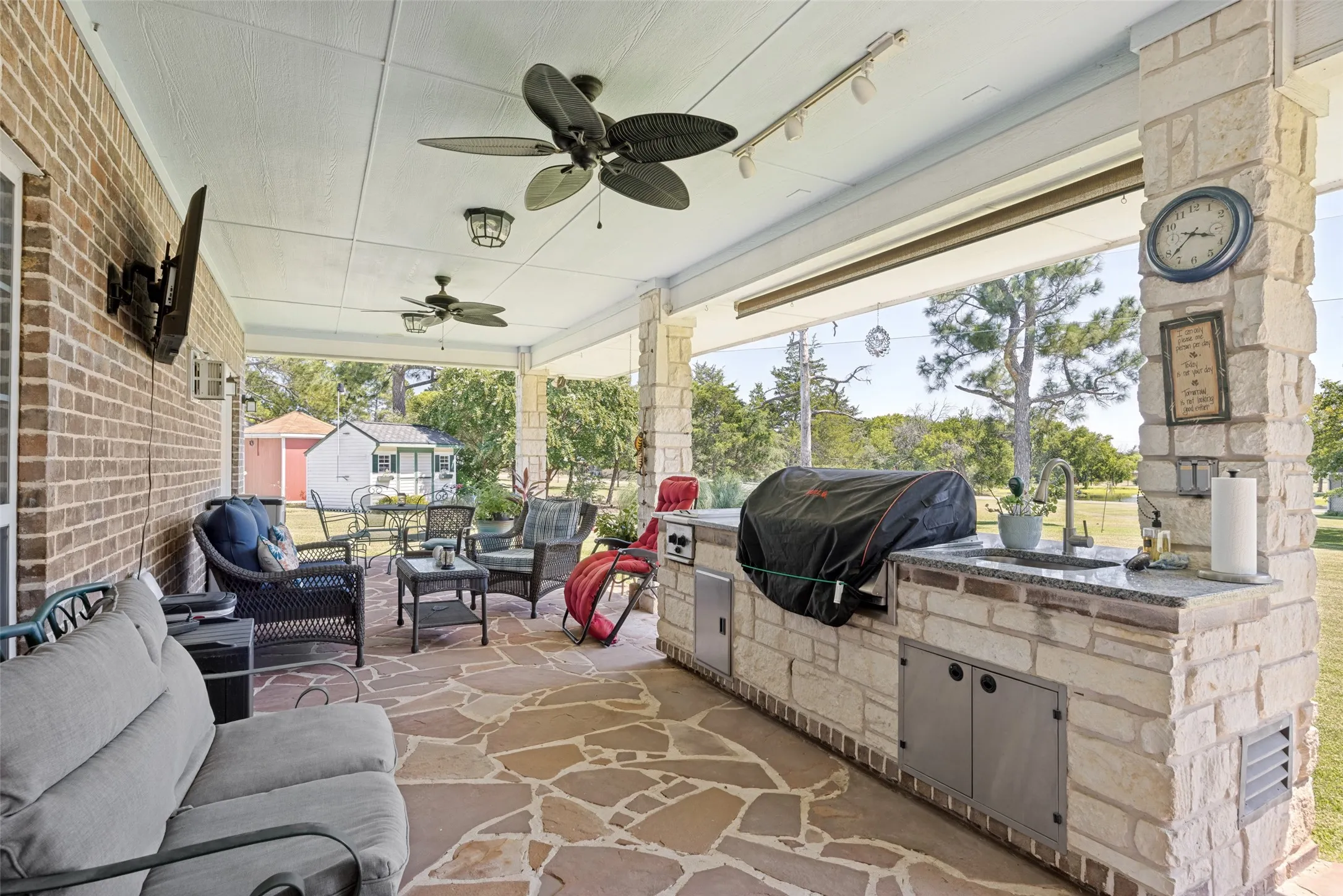 The outdoor kitchen is just outside the dining room and comes fully equipped with a Bull grill only used a handful of times! All gas appliances are supplied by a private underground propane tank.
