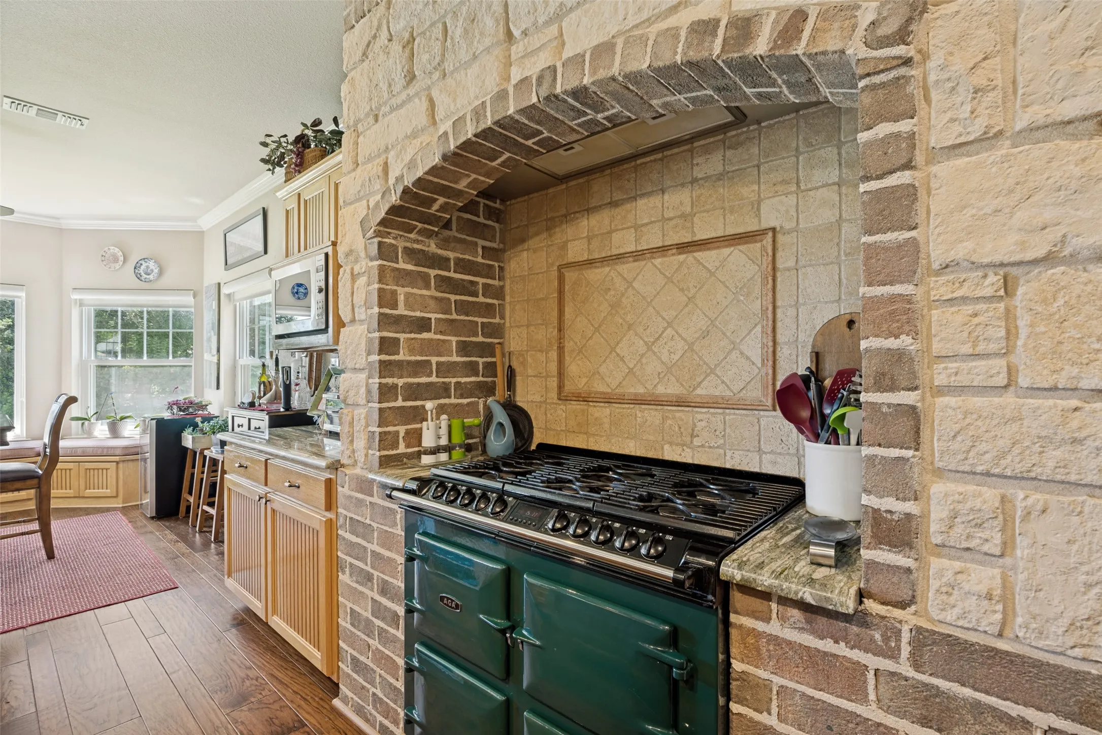 AGA 6-4 range features 6 burners and 4 separate ovens.