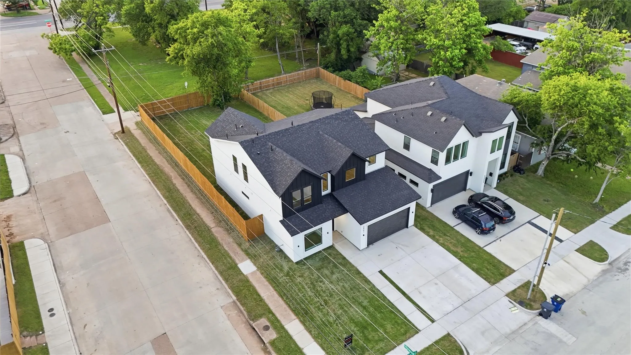 Modern facade with black roof and white exterior