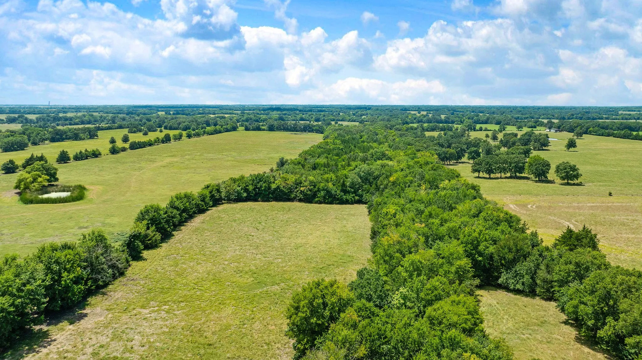 Single Family Residence For Sale in Red River (TX) County , 2606 Farm Road 412, Clarksville, Texas 75426, 3 Bedrooms, 2 Bathrooms, 2 Garage spaces, 1,500 Sqft, built in 1971, Price $624,900, mls#21345269, Real Estate Agent in Clarksville, Homes For Sale in Red River (TX) county, Homes For Sale in Clarksville, Realtor in Clarksville Texas, Real Estate Brokerage Independent Realty Texas, Luminita Cordes Realtor