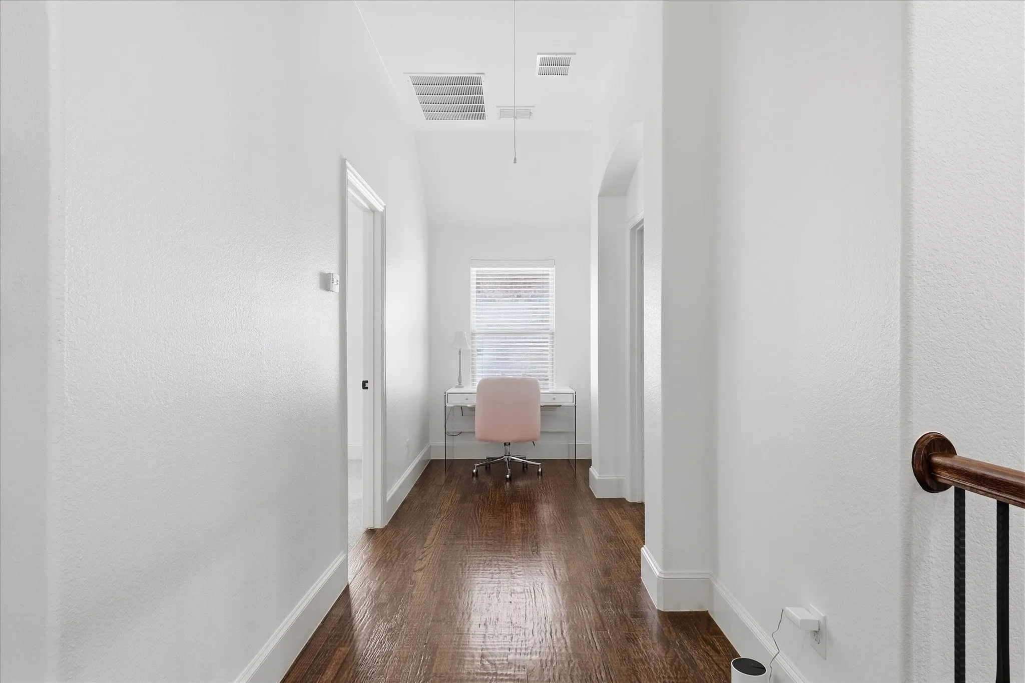Hallway to media room and bedroom 4