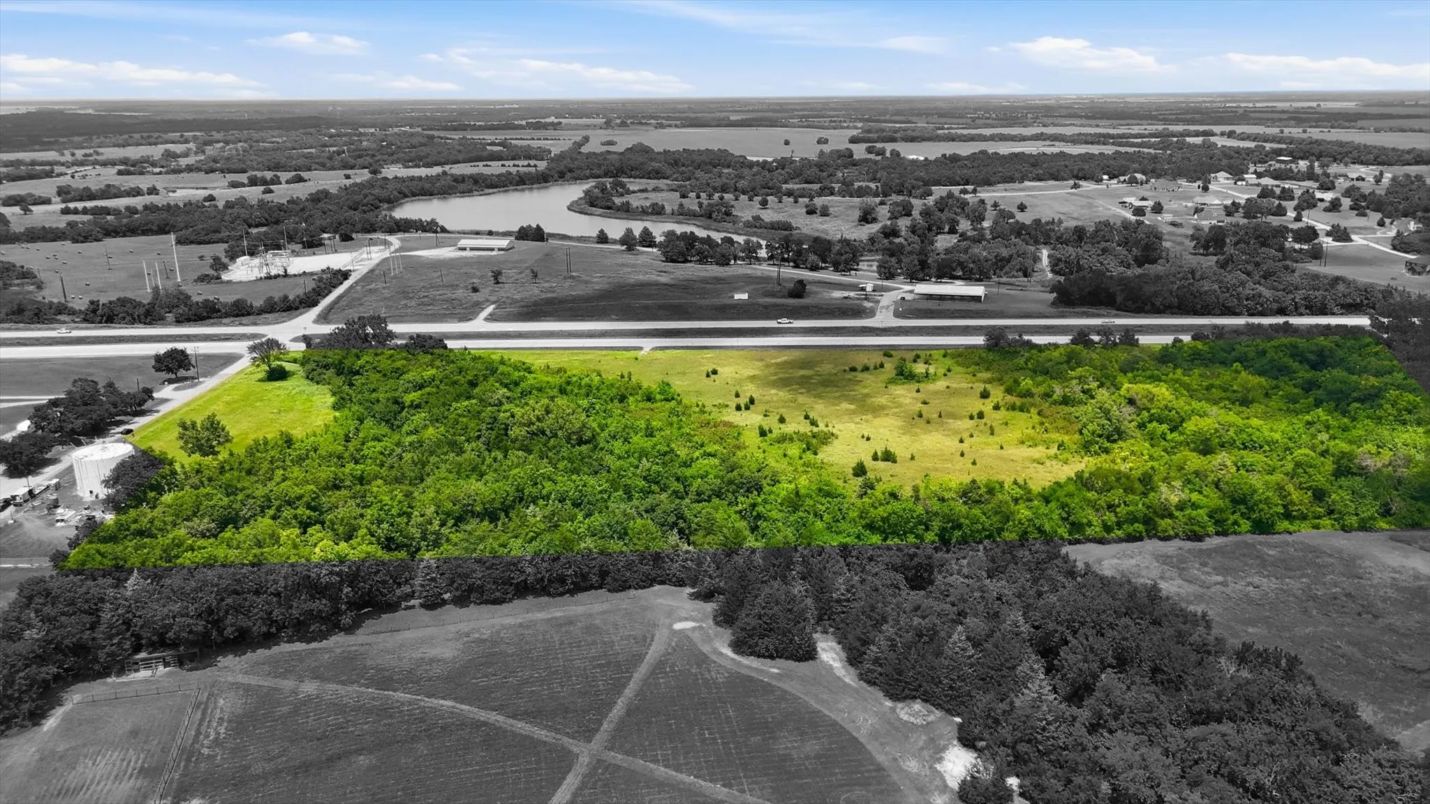 Expansive land parcel featuring a mix of dense tree coverage and open grassy areas