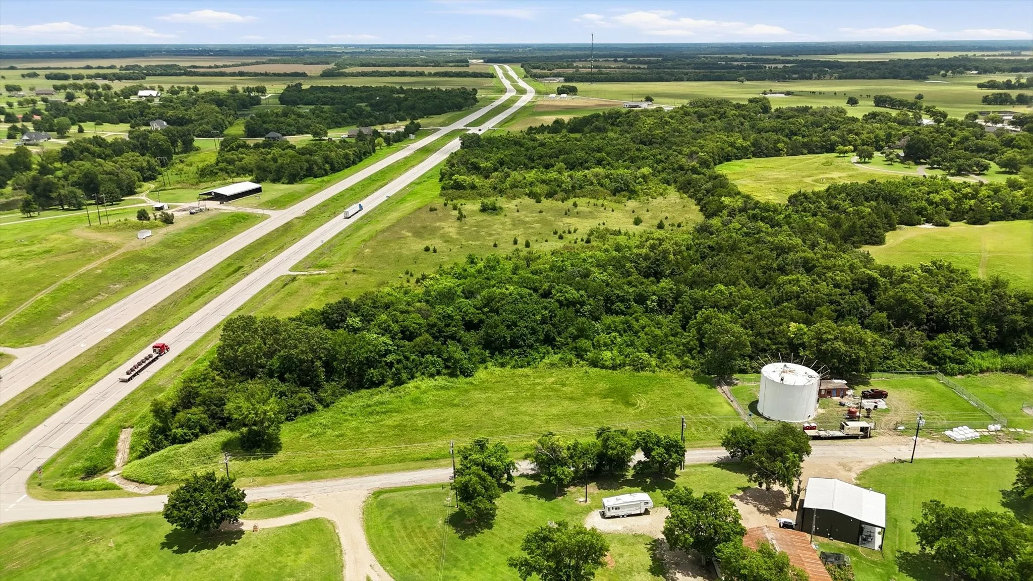 Expansive land parcel featuring direct highway frontage