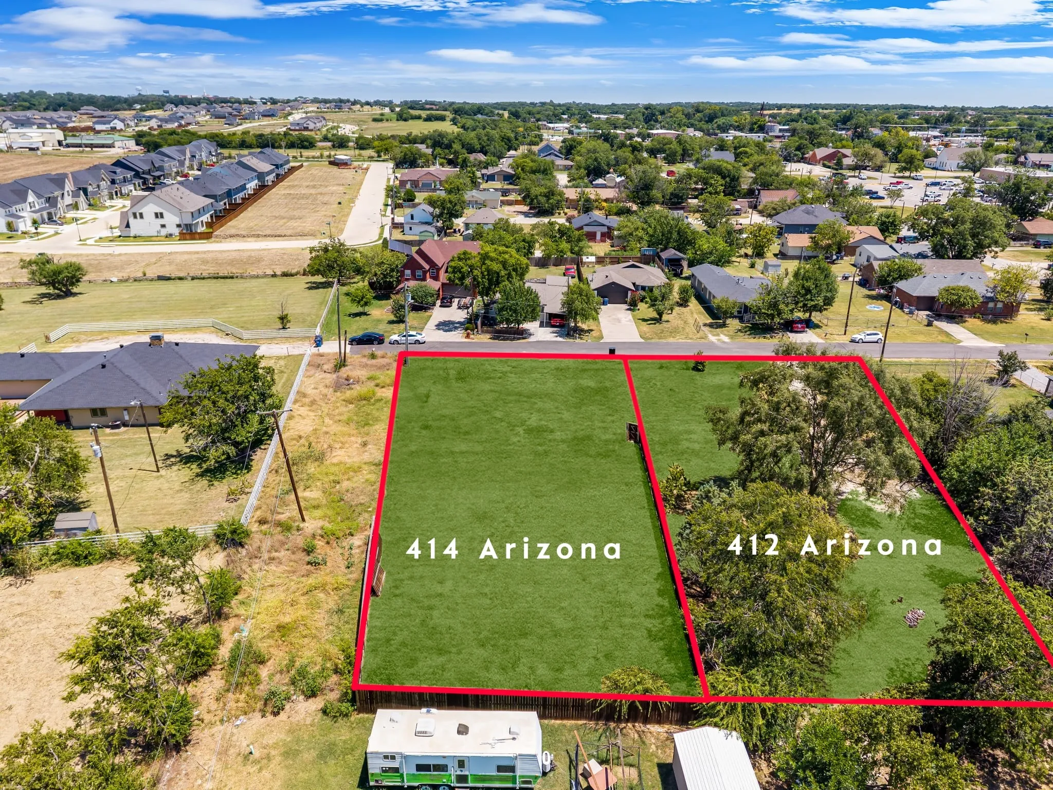 Photo enhanced aerial shot from back of property