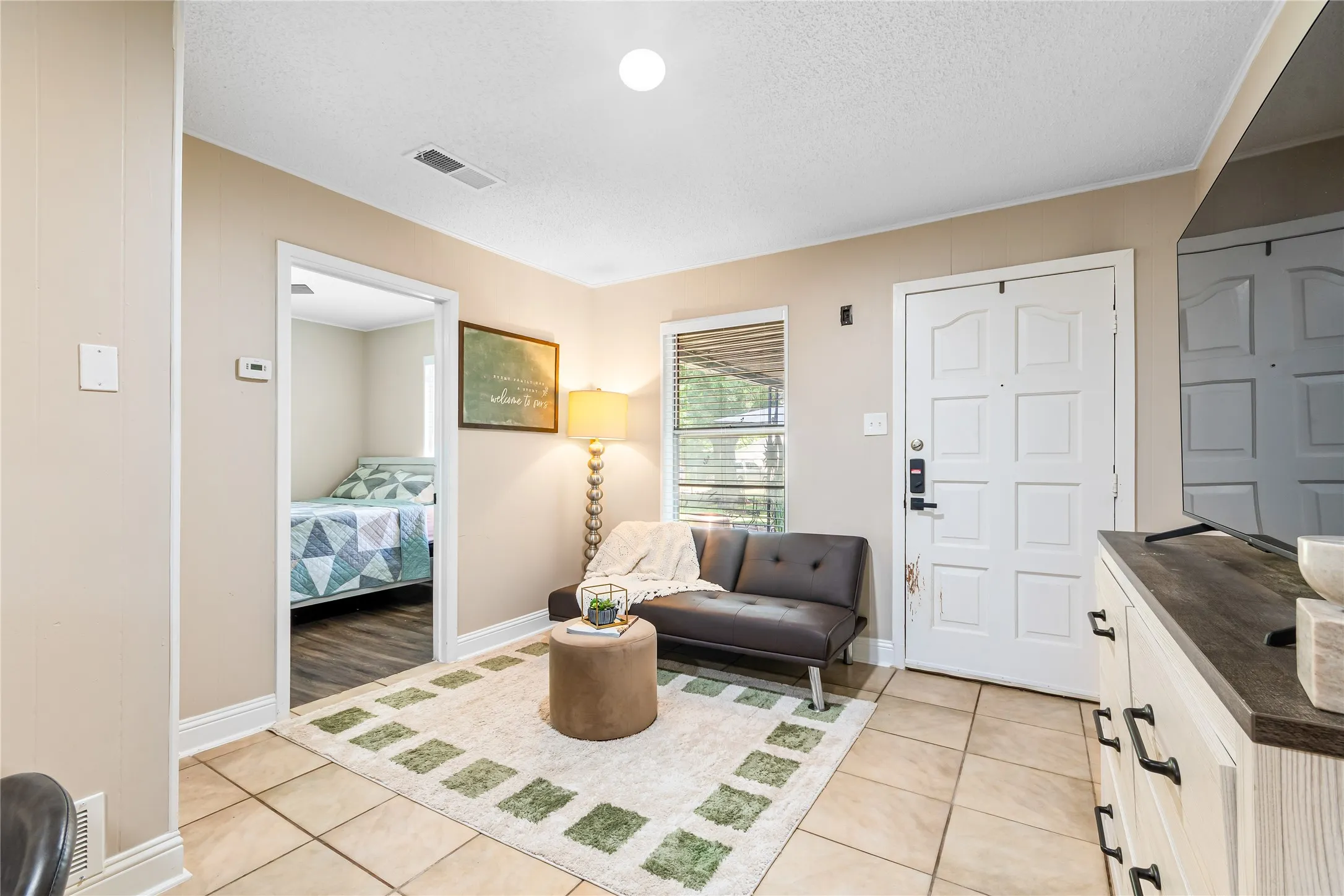 Casita Entryway featuring neutral wall tones and tile flooring