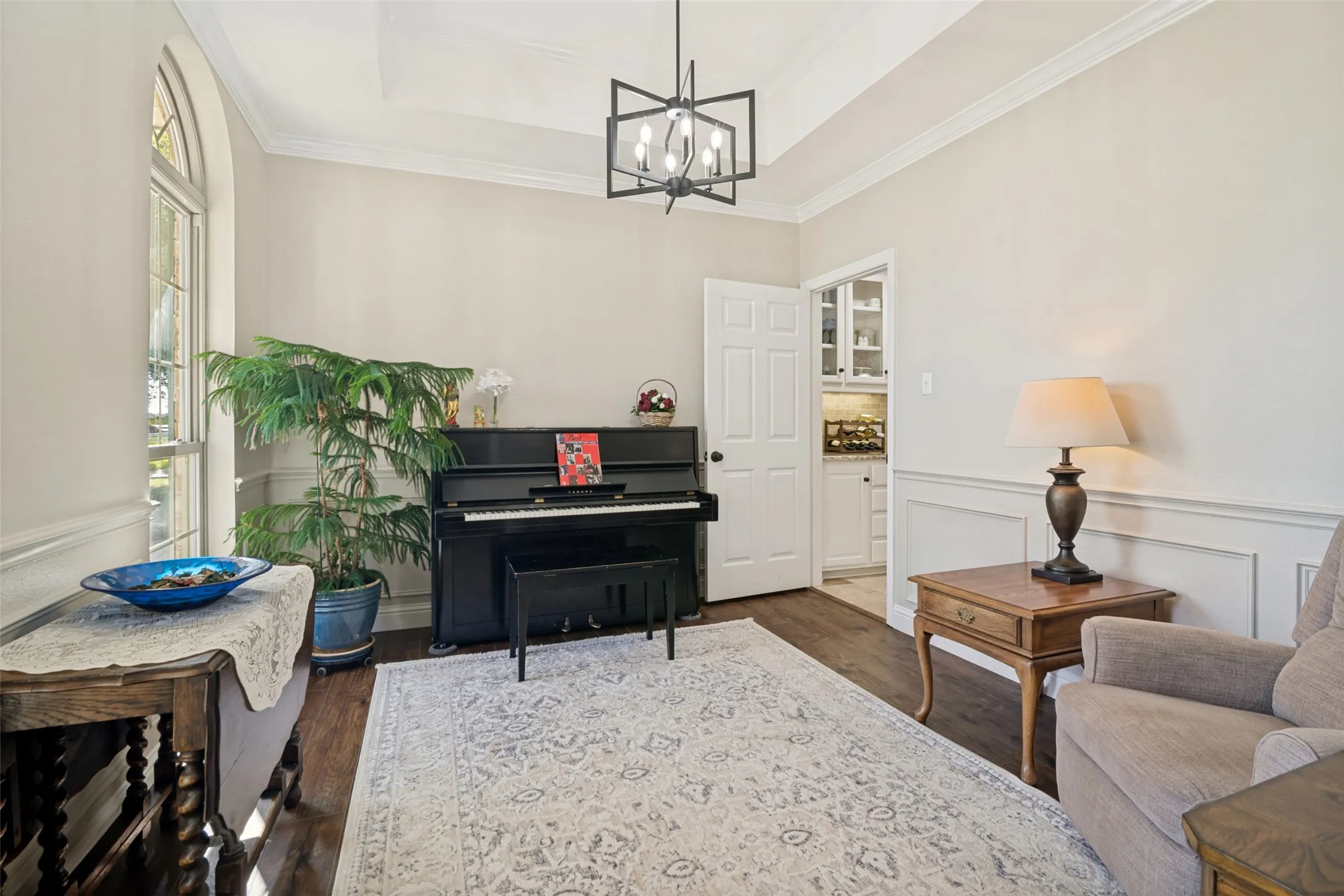 Currently used as a sitting room, notice the ceiling and trim details.