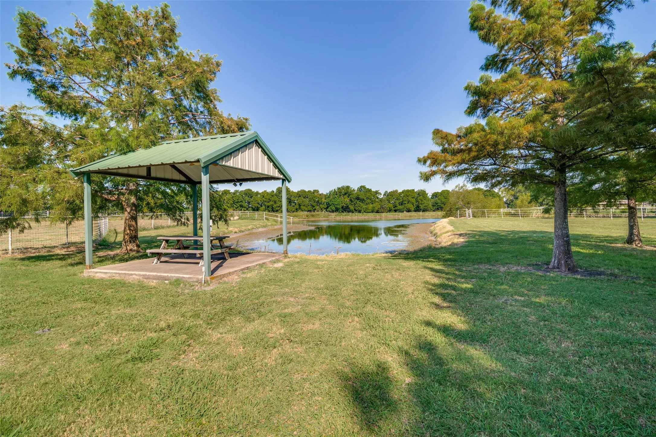 The pond in the back is shared with the neighbor.