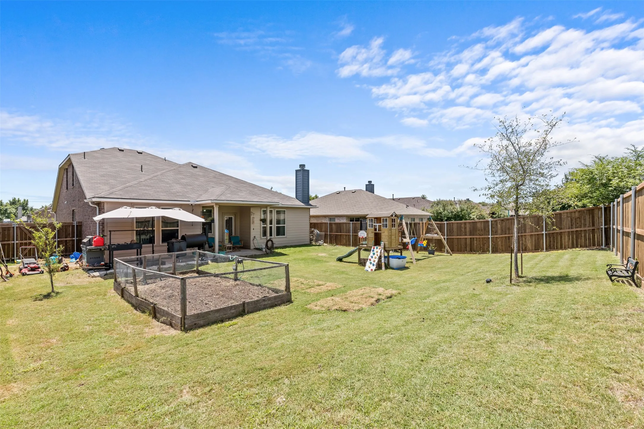 Large backyard with garden area