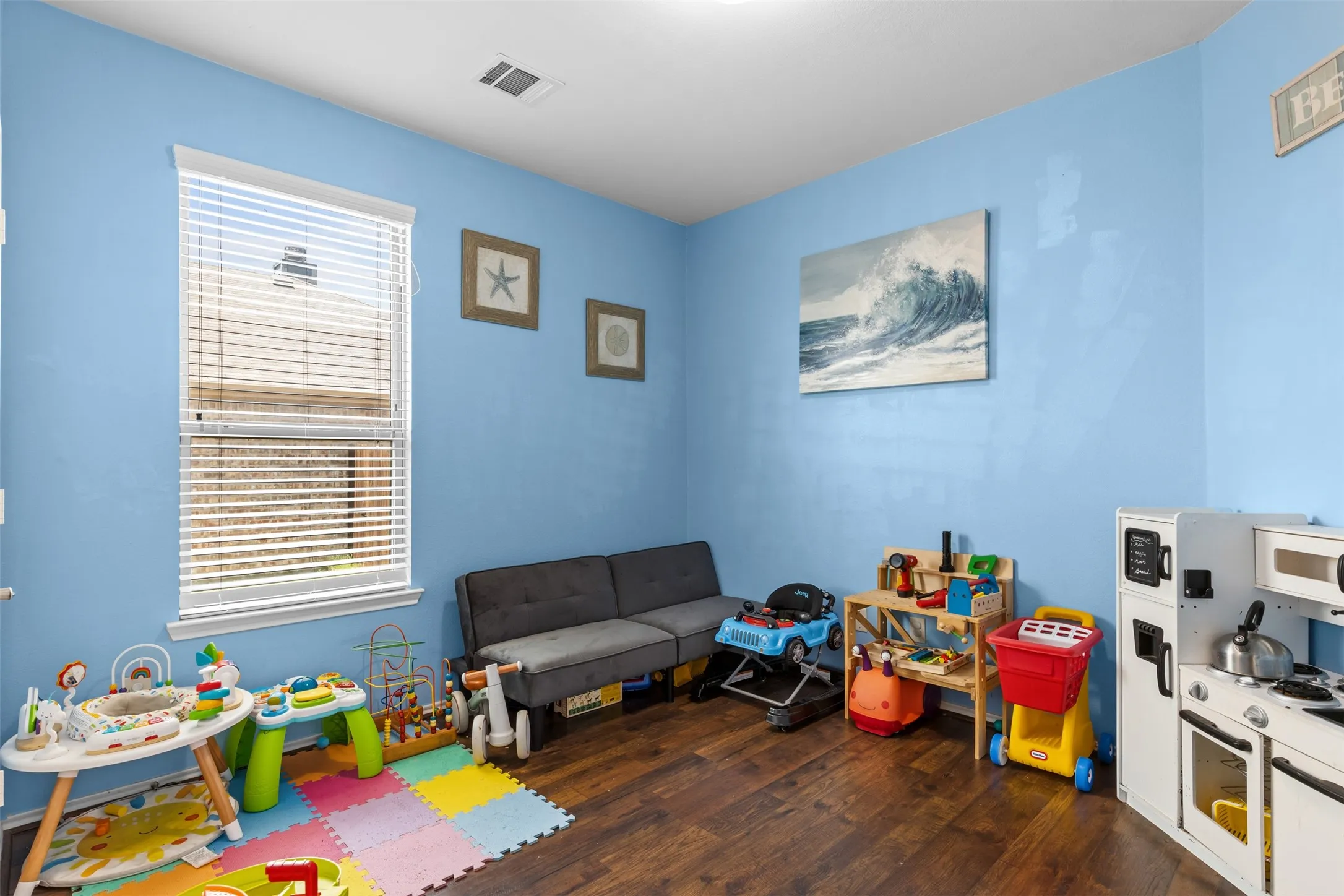 Bedroom 3 with wood flooring