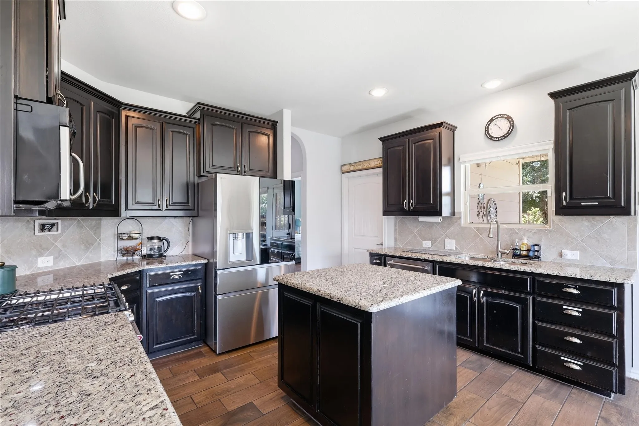 Beautiful, spacious kitchen, granite counter tops, upgraded soft close drawers & cabinets with island