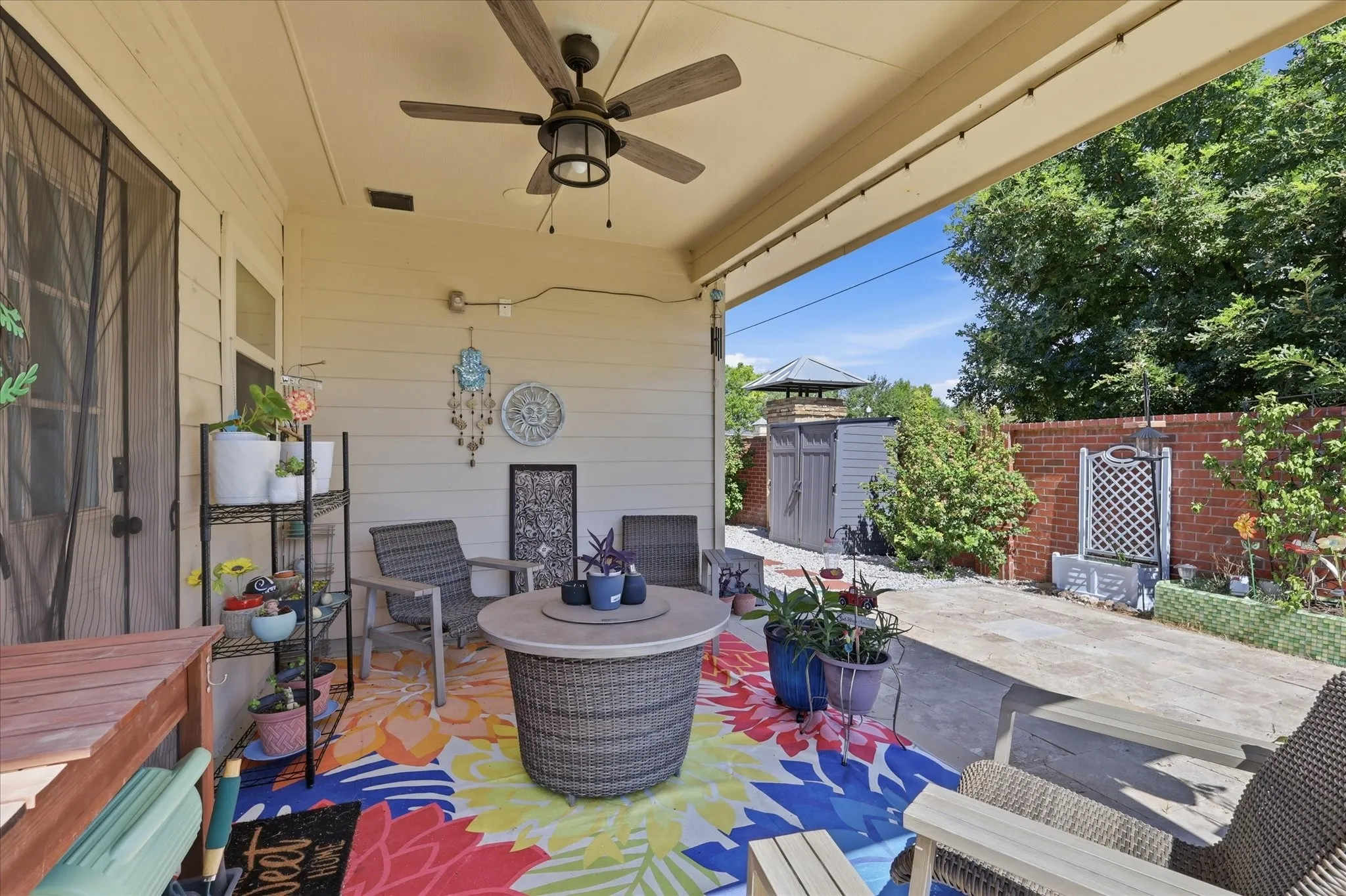 Nice sized covered patio with ceiling fan