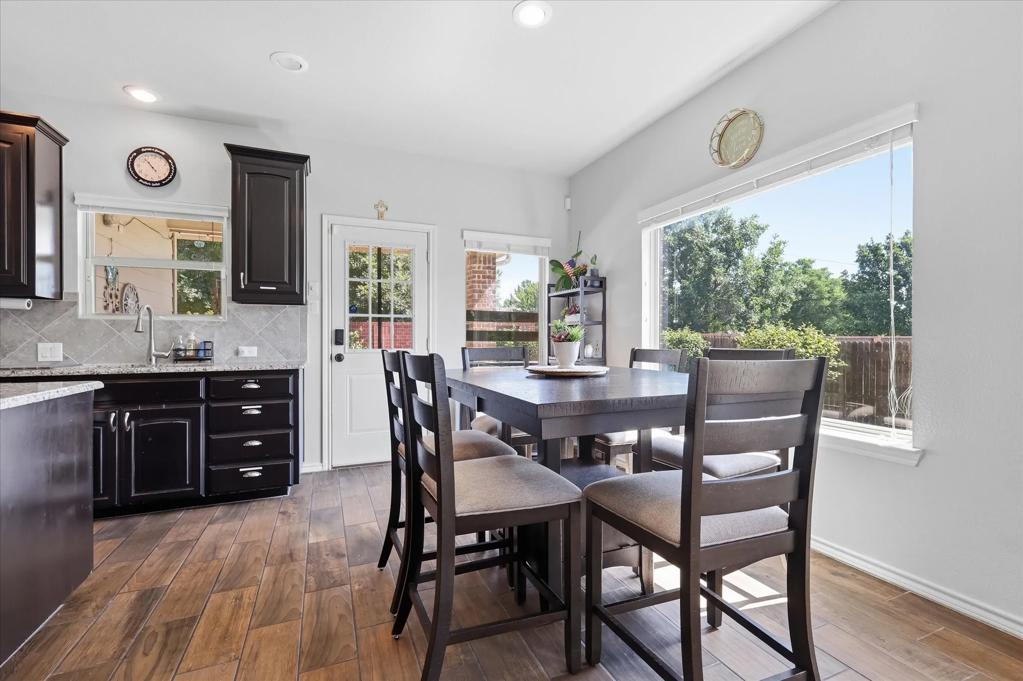 Dining Room with lots of natural light & door to back patio