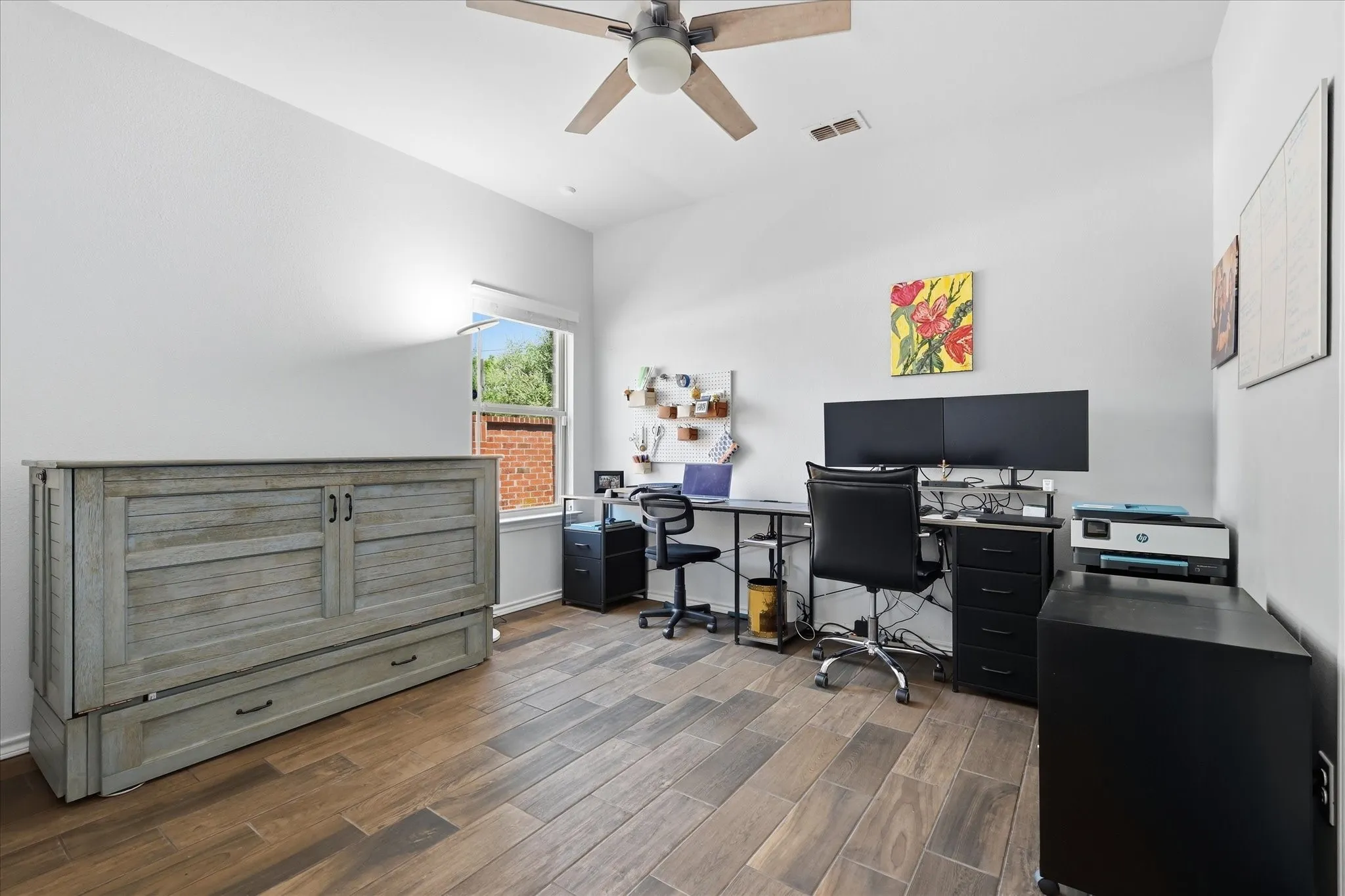 Updated wood like title as well as ceiling fan - currently used as an office
