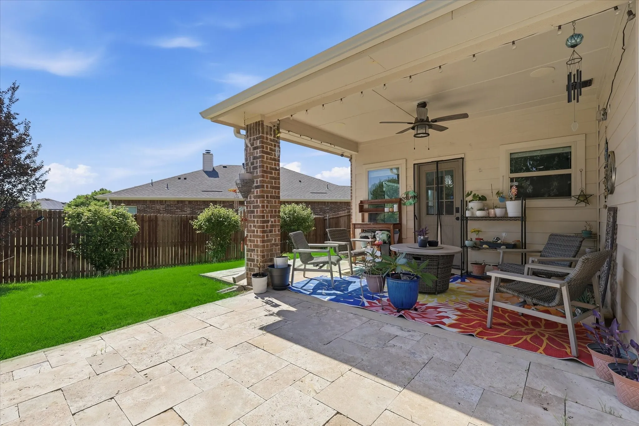 Large covered patio as well as open extended patio and backyard