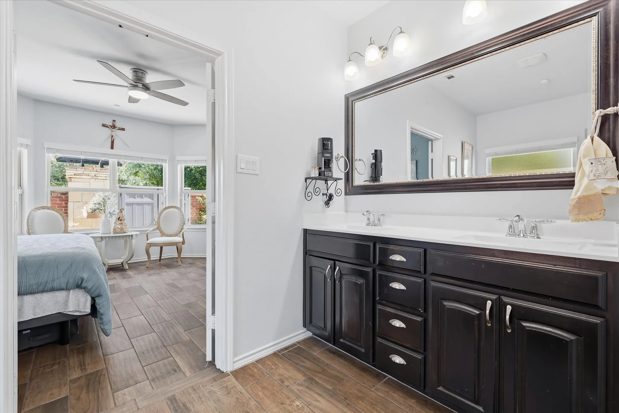 Primary bathroom with separate W.C., separate shower and tub and large walk-in closet