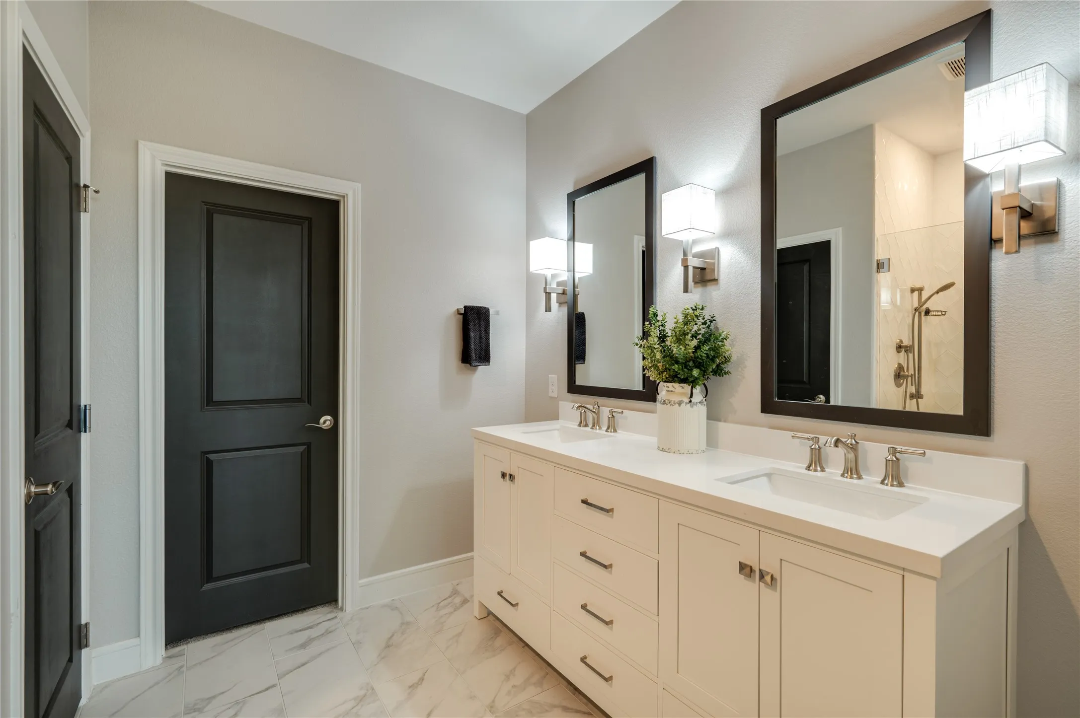 Primary bathroom with modern style decor.
