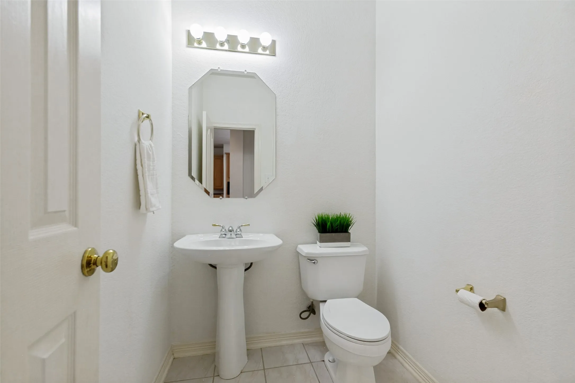 The powder bathroom on the first floor is convenient for guests