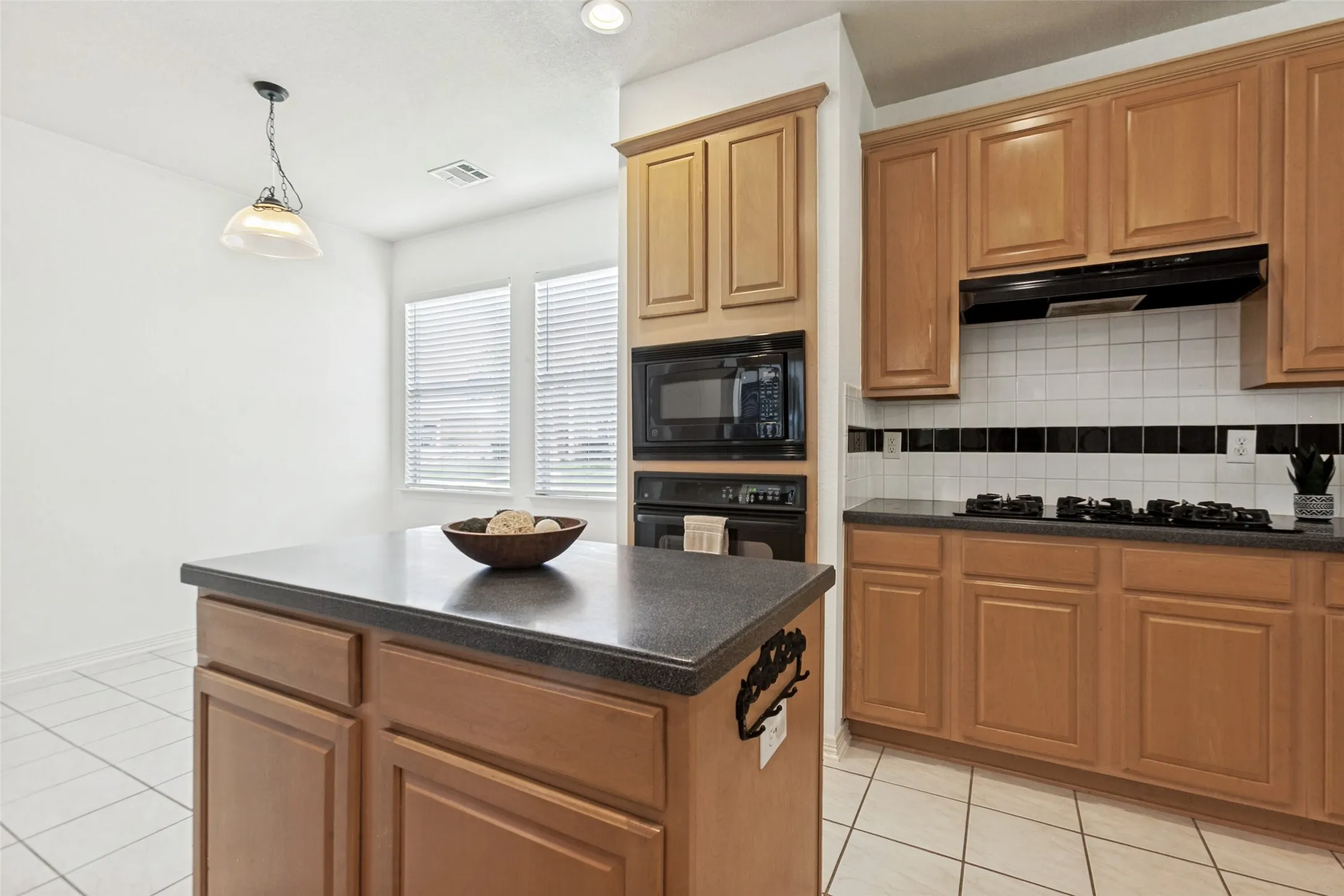Gas range located in the kitchen
