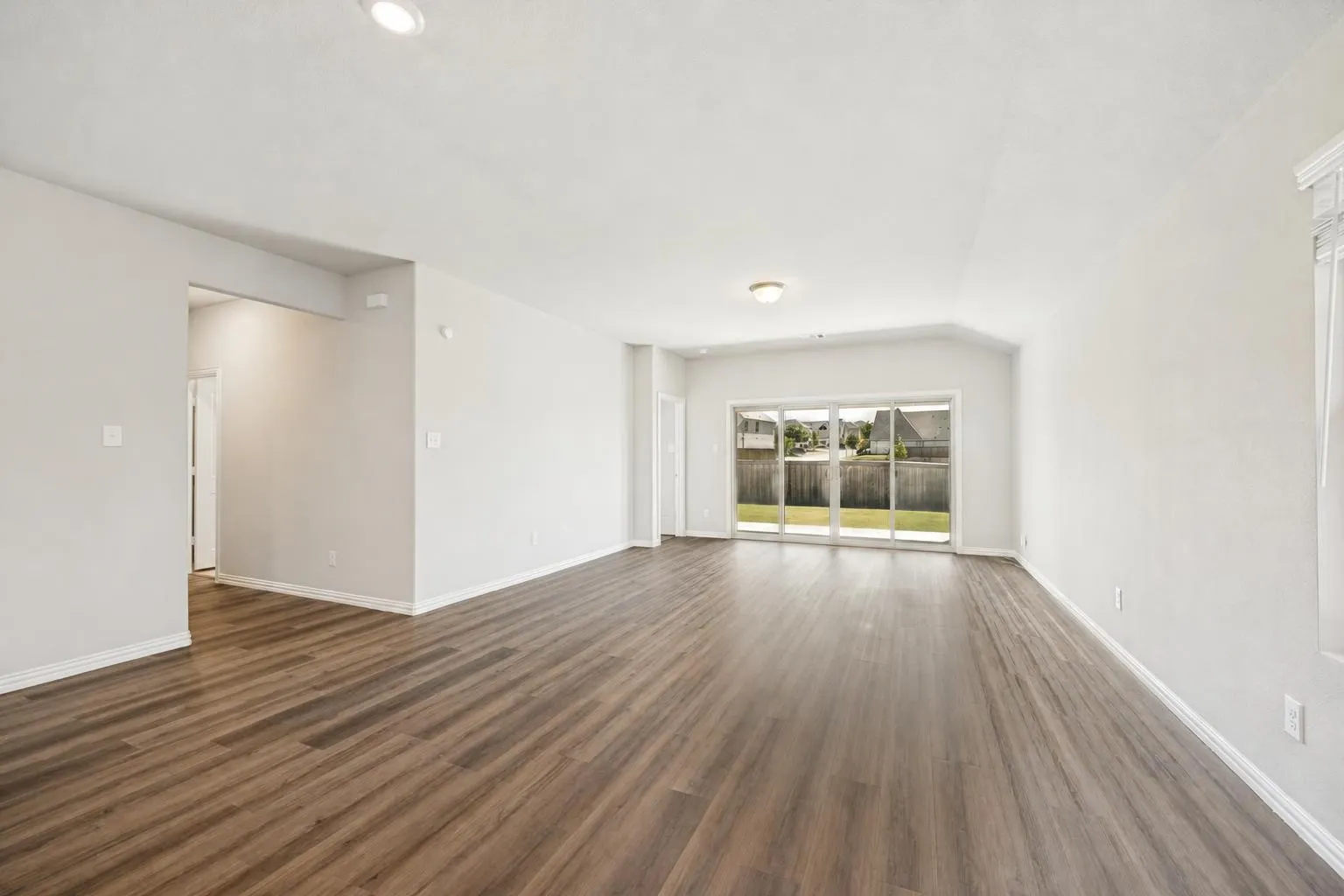 Walk in to a beautiful view of your backyard.