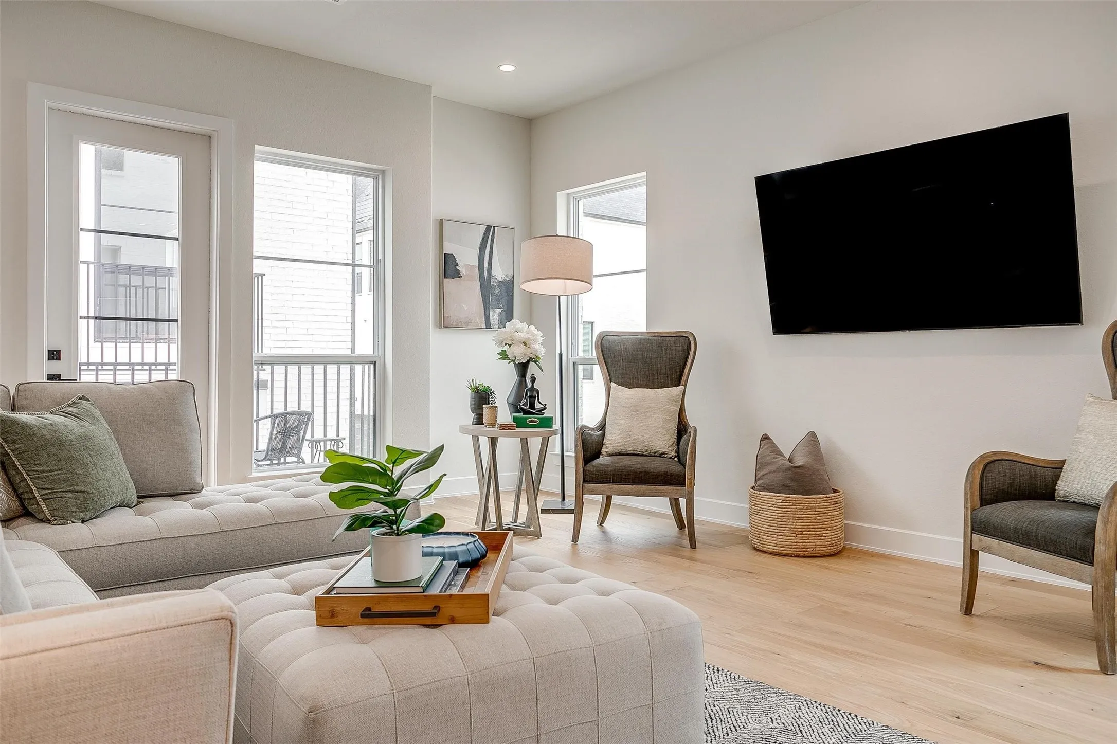 Living room featuring wood finished floors and recessed lighting