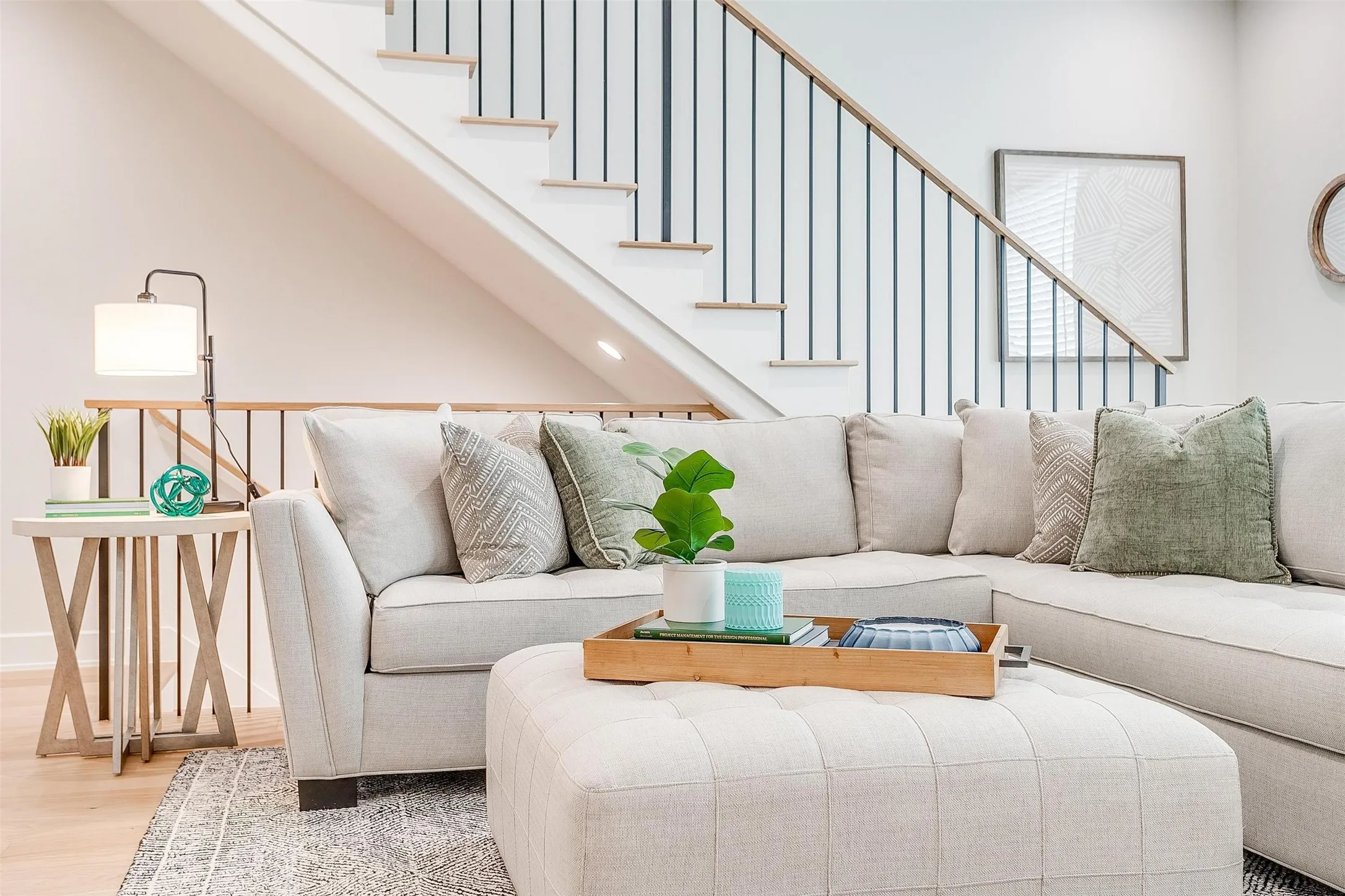 Living area featuring wood finished floors and stairs