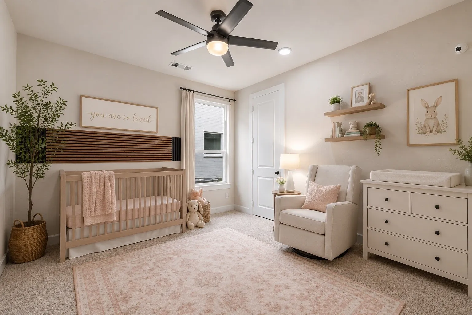 Virtually staged nursery room 1st floor 2nd bedroom