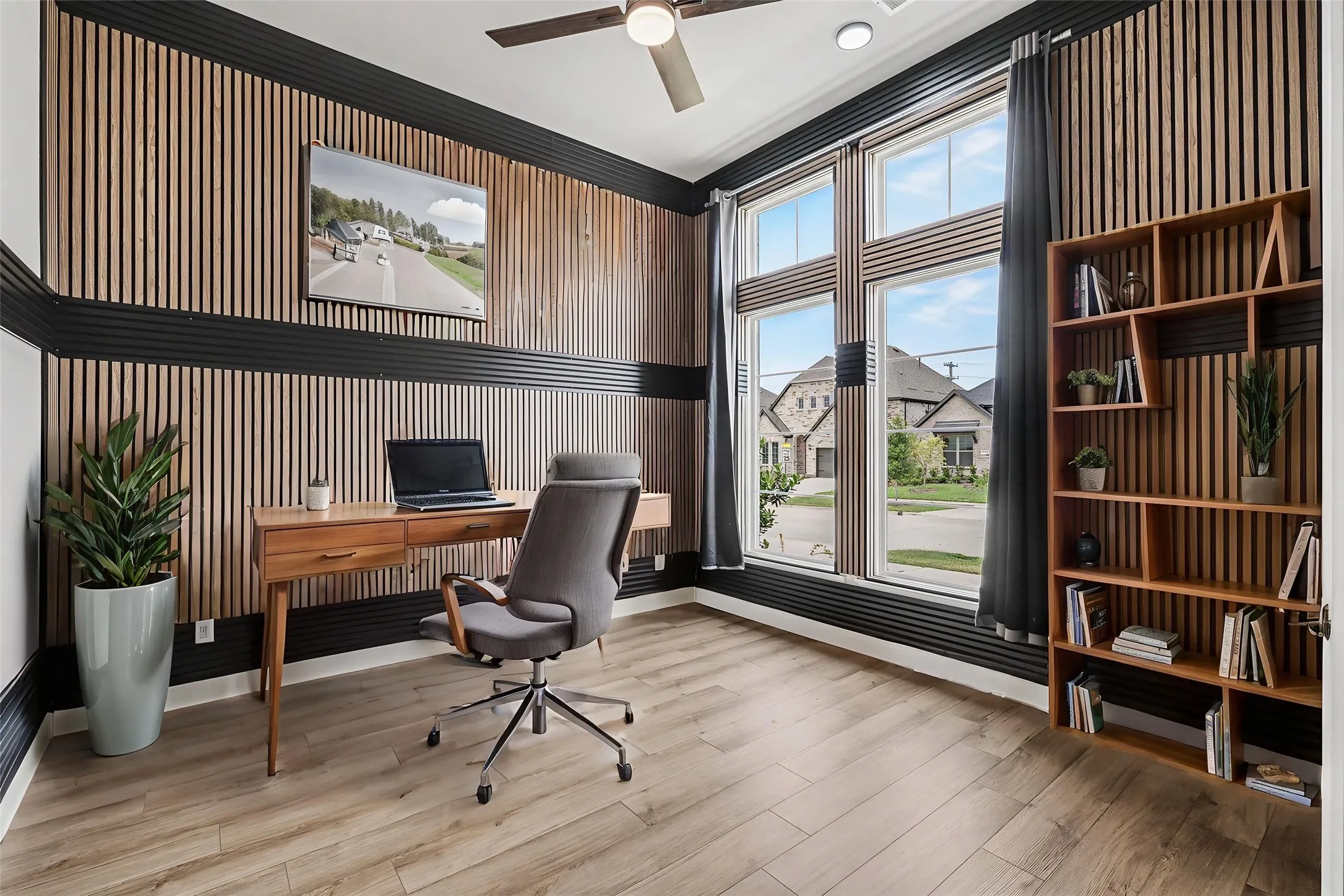 Custom trim in office.  furniture virtually staged