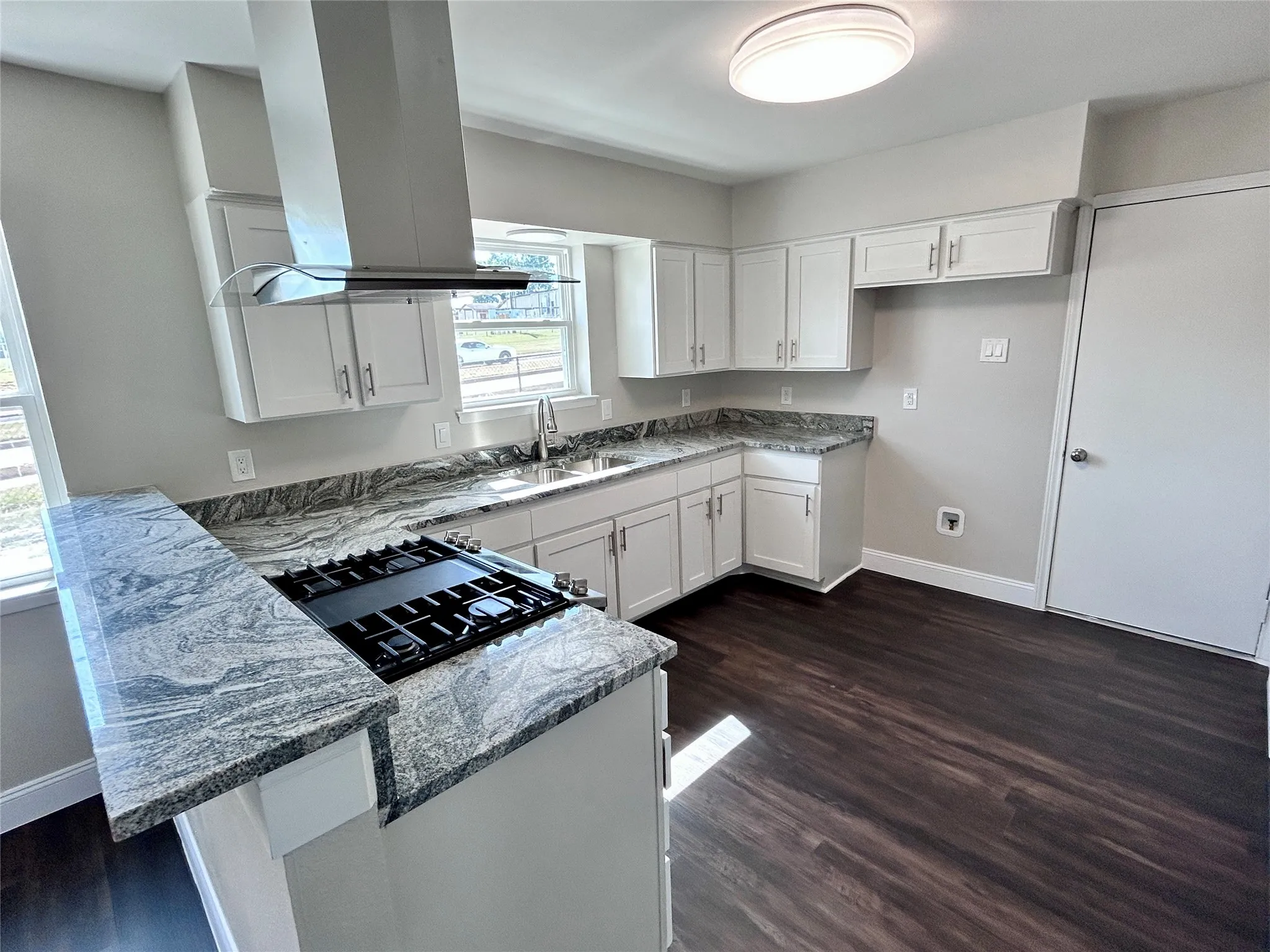 Updated with granite countertops, new vent, Hood, and Great area to put stools and eat in kitchen if desire.