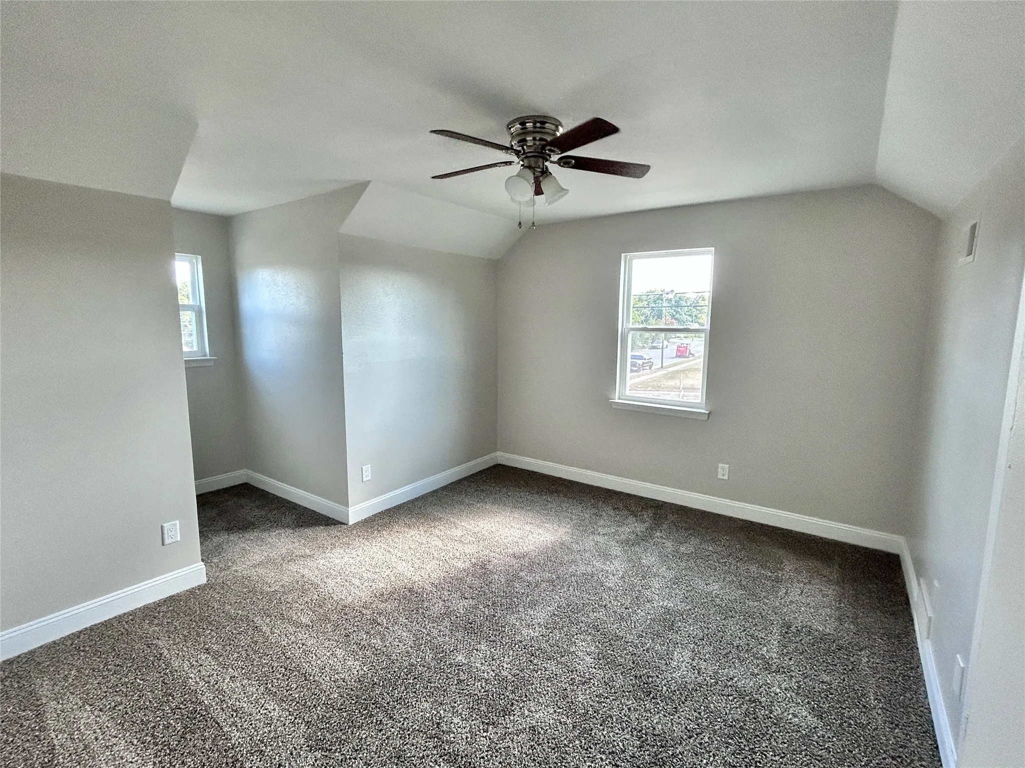 4th bedroom upstairs with space for a small desk and natural light.