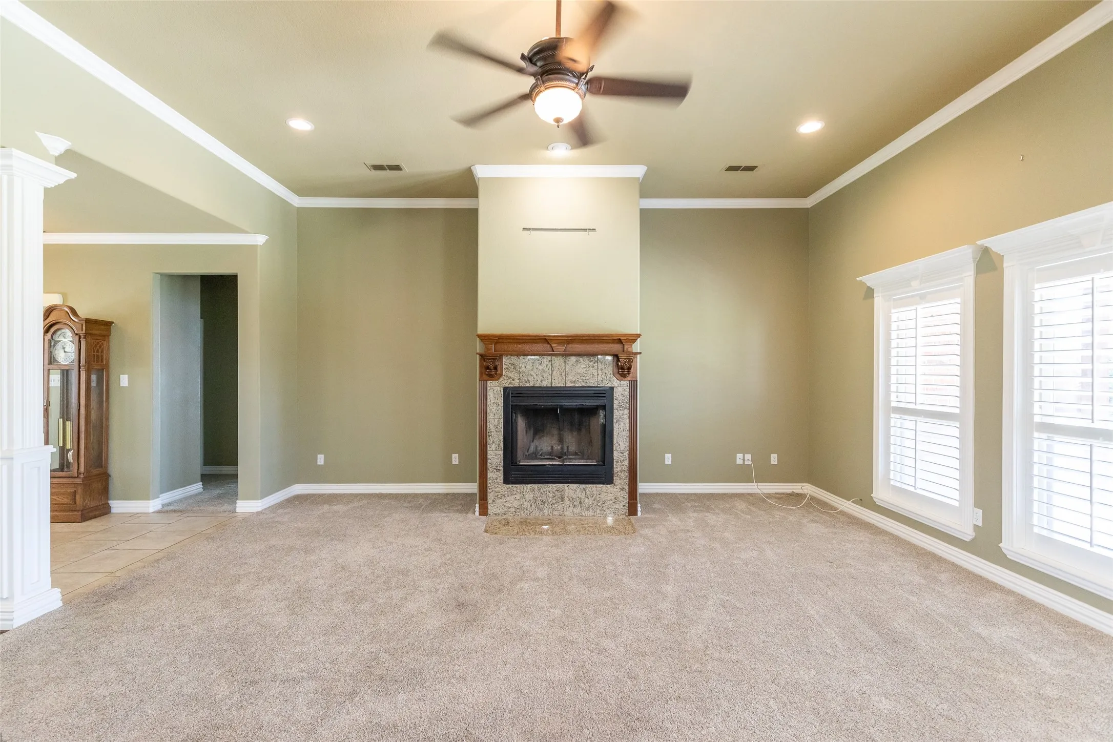 Living room with wood burning fireplace