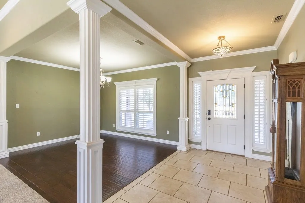 Front entrance with formal dining room