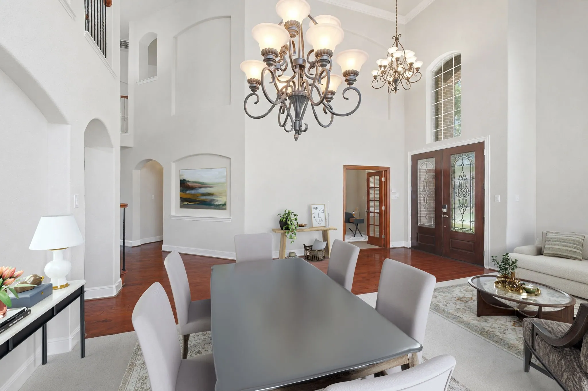 Formal Dining And Living Room Showcasing Soaring Ceilings Which Has Been Virtually Staged.