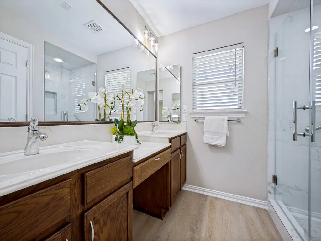 Renovated shower, new flooring, & new light fixture!