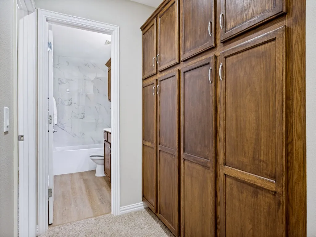 Amazing storage in this hallway built-in cabinet!