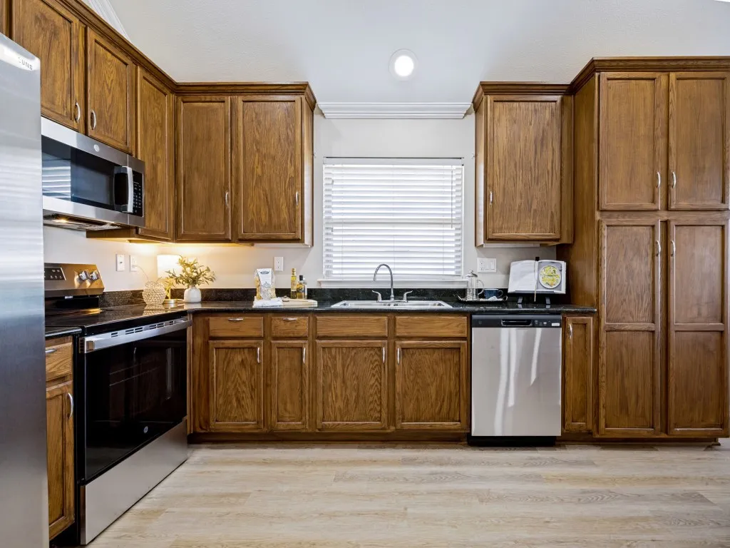 New GE range, dishwasher, & microwave! Refrigerator conveys with the home!