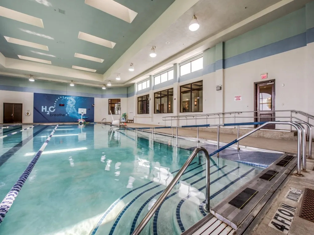 Community amenities feature an indoor lap pool and outdoor pools as well!