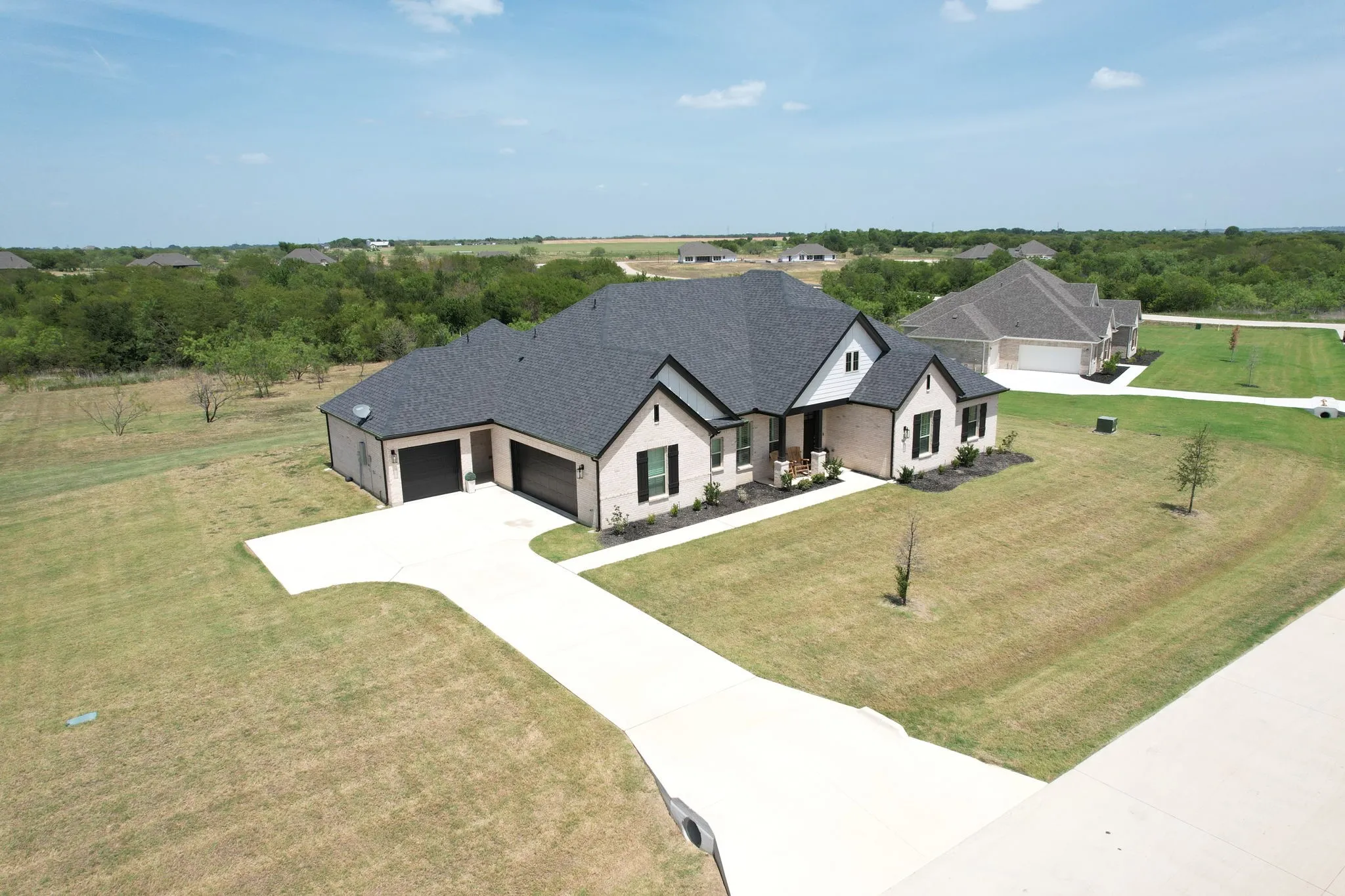 Love the three car garage with one of them being a separate space that you can. add storage.