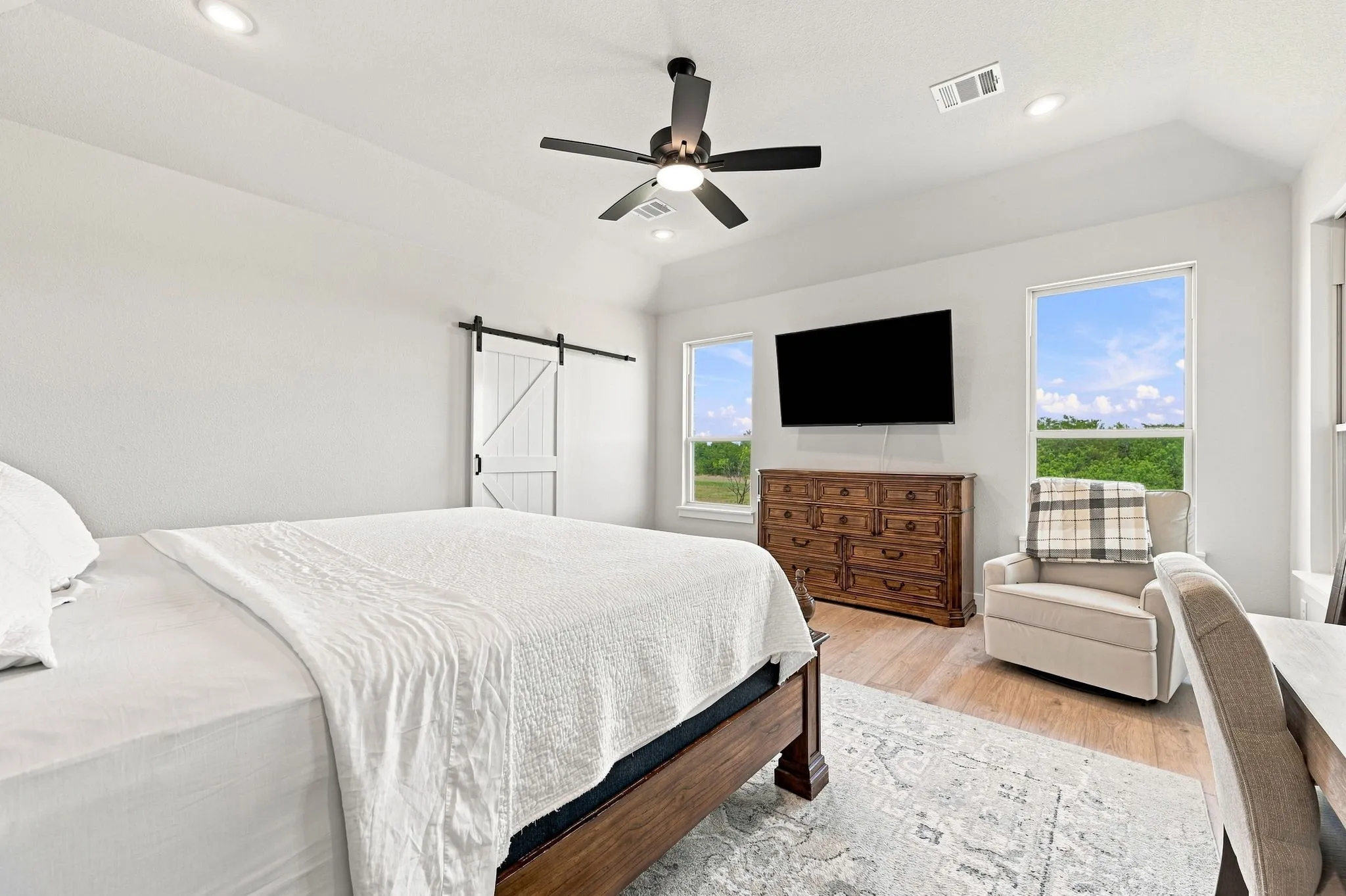The primary bedroom is at the back of the home in a split floor plan.